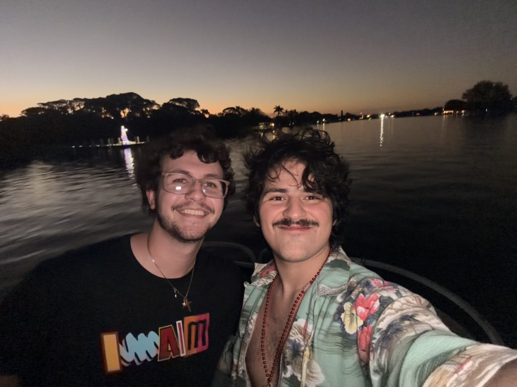 Cruz Paxton on a boat at sunset