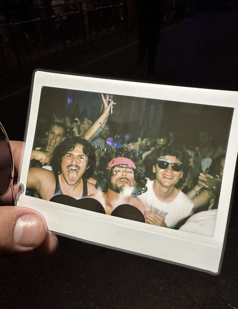 Polaroid of Cruz Paxton with friends